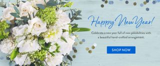 New Year's celebration with white flowers and confetti - flower delivery in Henderson